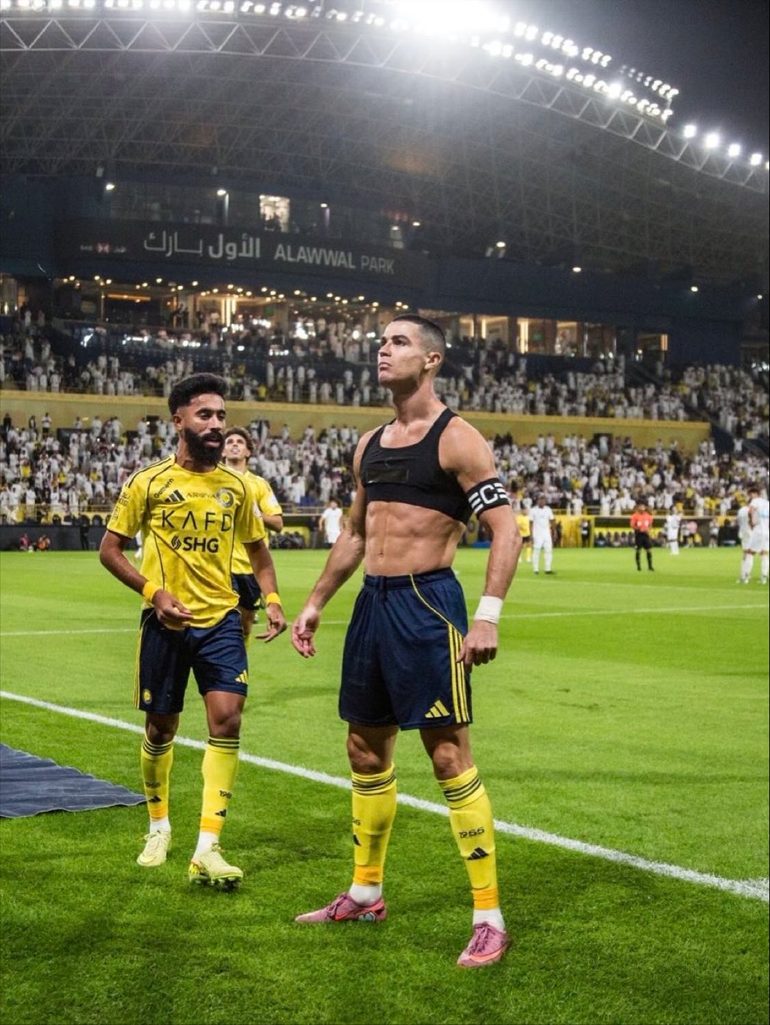 Cristiano Ronaldo, wearing the captain's armband, celebrating a goal for Al Nassr at Al Awwal Park in Riyadh