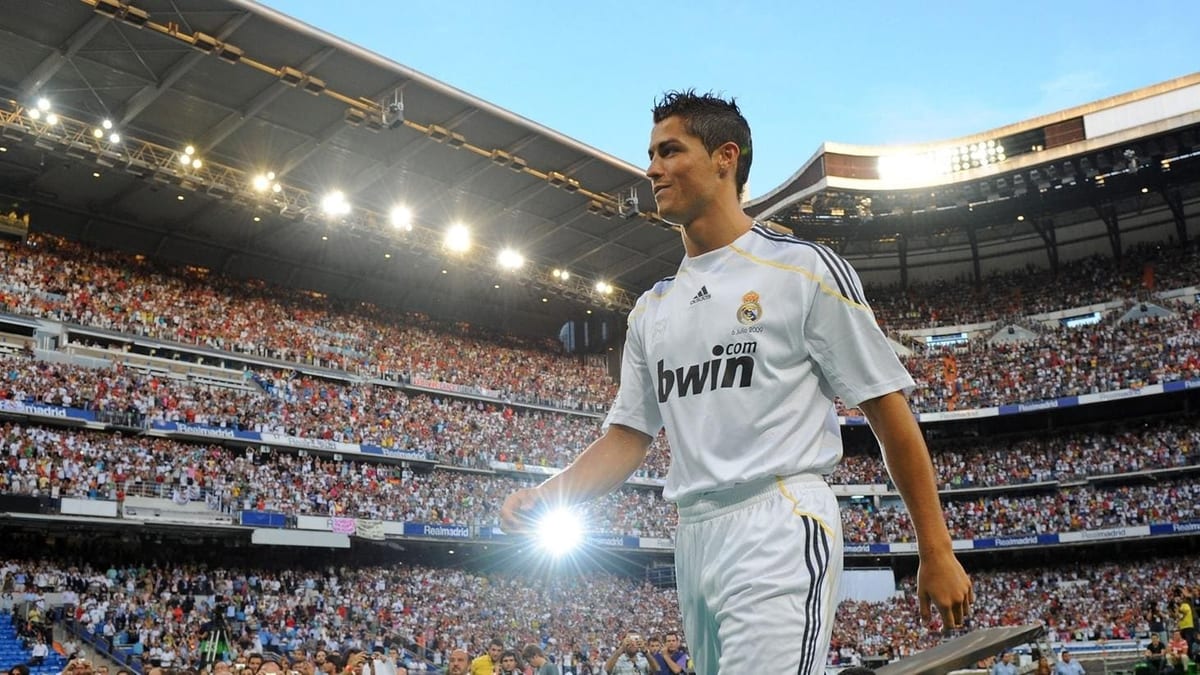 Cristiano Ronaldo walking out to a packed Bernabeu to be presented as a Real Madrid player