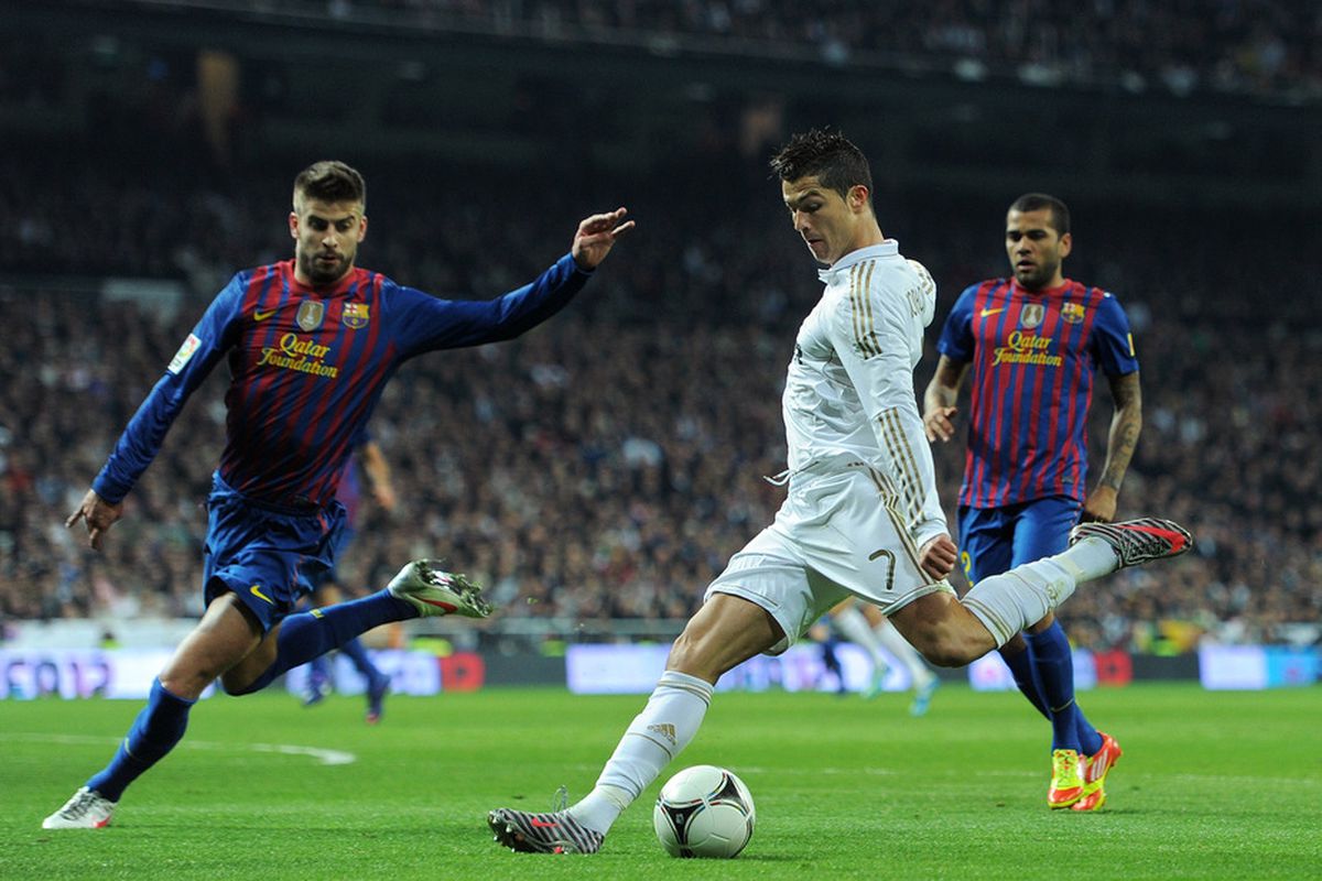 Cristiano Ronaldo shooting for Real Madrid against Barcelona at the Santiago Bernabeu in the 2012 Copa del Rey
