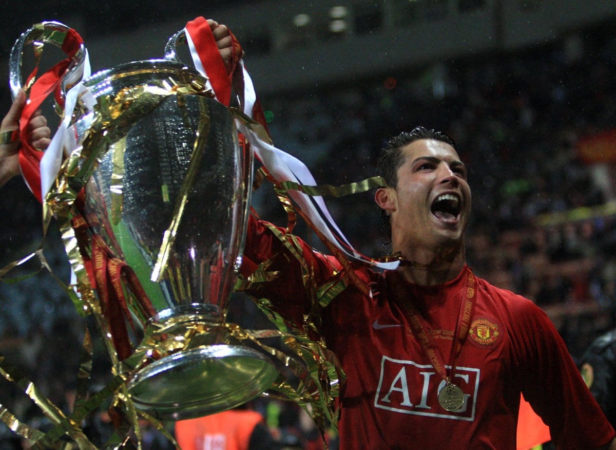 Cristiano Ronaldo lifting the Champions League trophy in the Moscow rain after Manchester United beat Chelsea